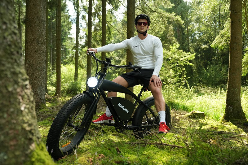 A man riding hidoes b3 fat tire ebike in the forest